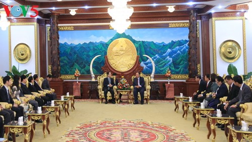 ประธานประเทศลาวชื่นชมประสิทธิผลของความร่วมมือระหว่างสำนักประธานประเทศของเวียดนาม-ลาว - ảnh 1