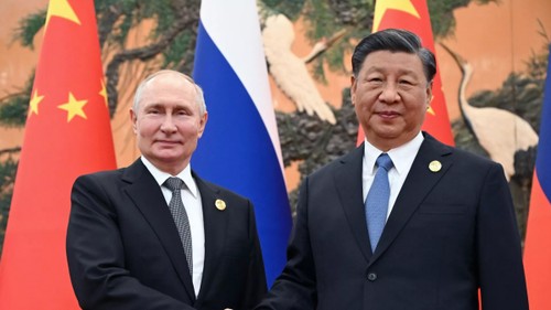 ผู้นำรัสเซียและจีนพูดคุยทางโทรศัพท์ - ảnh 1