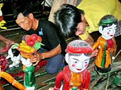 El teatro de las marionetas de agua, un arte peculiar de los Viet - ảnh 1
