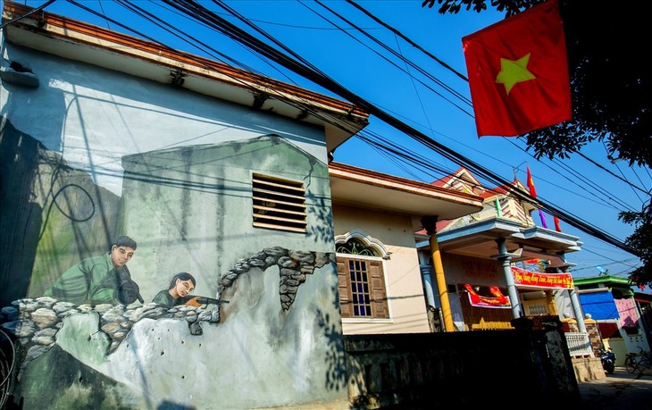 La aldea de Canh Duong renueva su fisonomía con un nuevo mural - ảnh 2