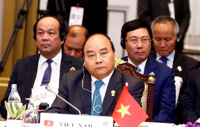 Primer ministro de Vietnam asiste a sesión plenaria de trigésimo cuarta Cumbre de la Asean - ảnh 1