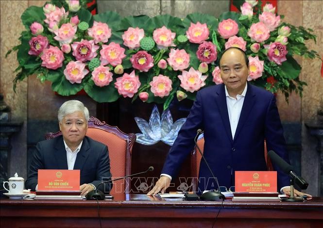 Fortalecimiento de la cooperación entre el jefe de Estado y el Frente de la Patria de Vietnam - ảnh 1