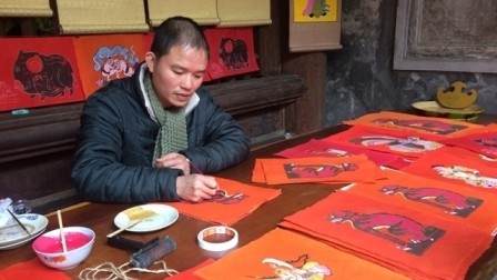 Recrean ambiente tradicional del Año Nuevo Lunar en el Casco Antiguo de Hanói - ảnh 1