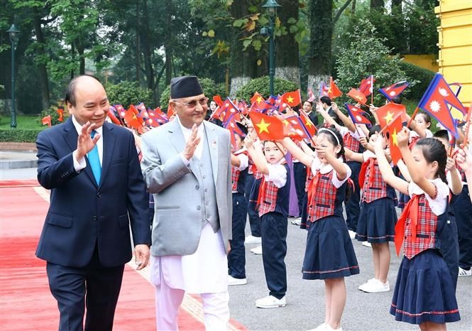 El primer ministro vietnamita se reúne con su homólogo nepalí - ảnh 1