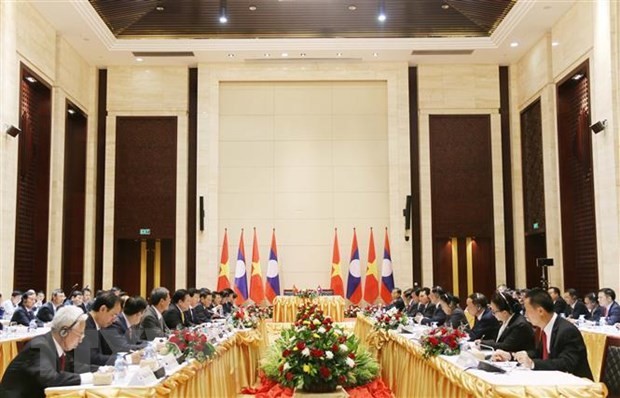 Viceprimer ministro Trinh Dinh Dung visita Laos - ảnh 1