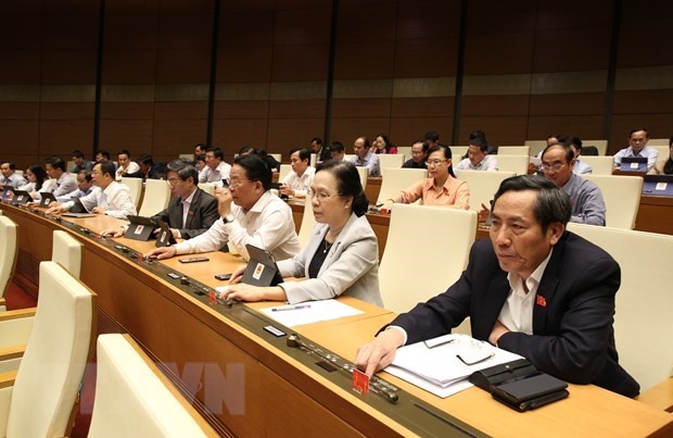 Diputados vietnamitas analizan importantes leyes para responder al cambio climático - ảnh 1