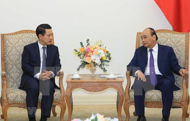 Premier de Vietnam recibe a canciller laosiano  - ảnh 1