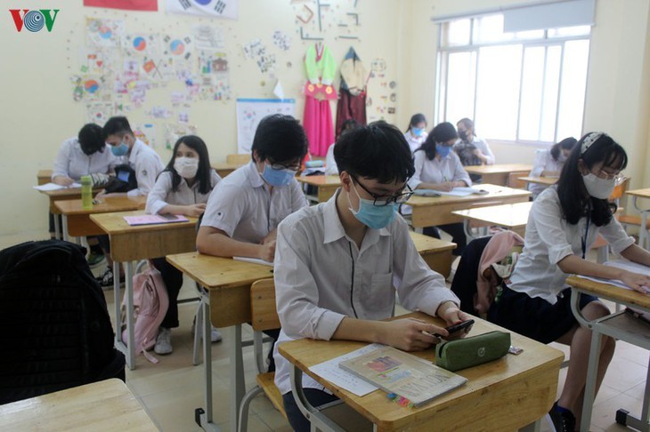 Alumnos de Hanói de regreso a las escuelas - ảnh 5