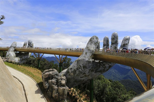 Puente Dorado de Da Nang, uno de los más bellos del mundo - ảnh 4