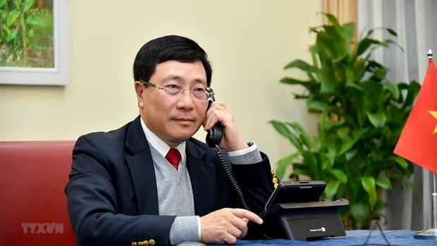 Canciller vietnamita mantiene conversación telefónica con el secretario de Estado de Estados Unidos - ảnh 1