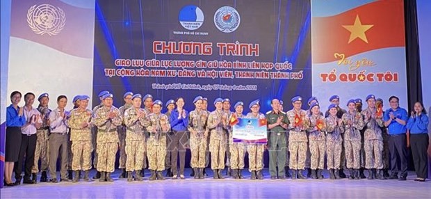 Celebran un intercambio entre personal de mantenimiento de la paz vietnamita y jóvenes de Ciudad Ho Chi Minh - ảnh 1