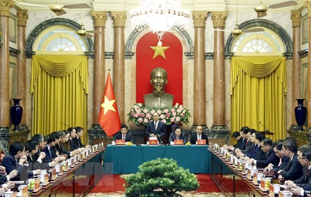 Presidente de Vietnam pide al sector empresarial nacional integrarse más ampliamente al mundo  - ảnh 1