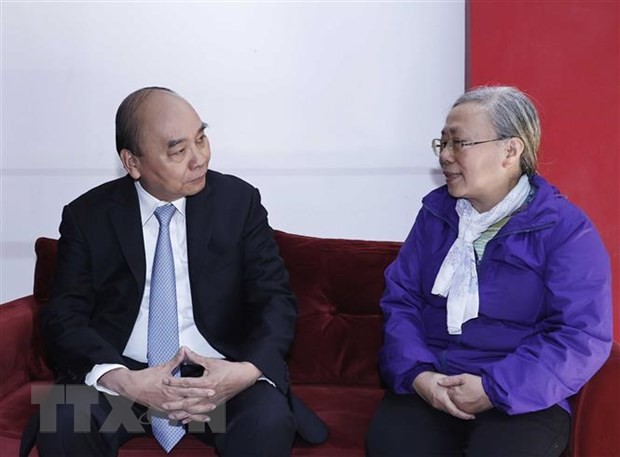Jefe de Estado visita a familias de expresidentes de Vietnam - ảnh 1