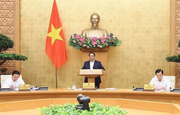 Objetivos importantes se cumplieron pese a turbulencias globales, según el primer ministro Pham Minh Chinh - ảnh 1