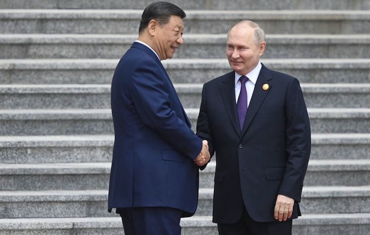 Xi Jinping conversa con Putin en Beijing - ảnh 1
