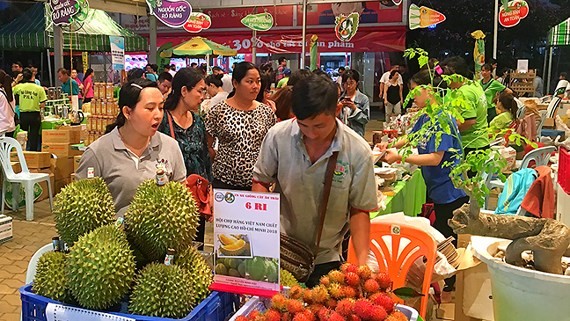 越南最大有机食品生产企业参加越南优质商品博览会 - ảnh 1