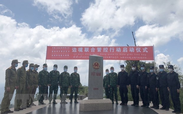 越南-中国-老挝边防力量举行交流会 - ảnh 1
