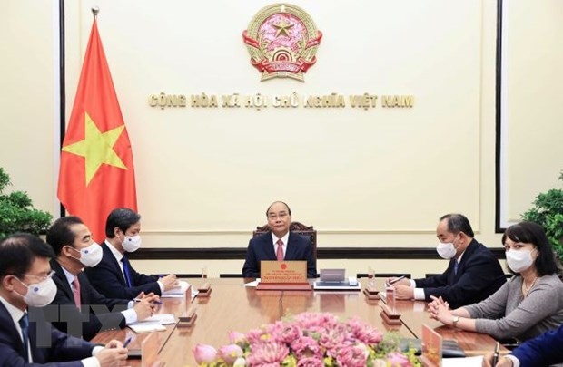 罗马尼亚媒体报道越南国家主席阮春福与罗马尼亚总统约翰尼斯通话 - ảnh 1