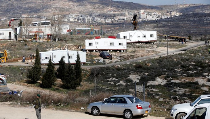 La police israélienne évacue des colons installés à Amona - ảnh 1