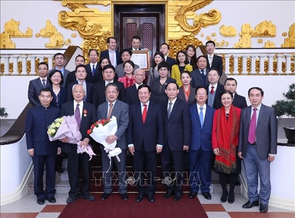 Accueil des délégués du forum populaire Vietnam-Chine - ảnh 1