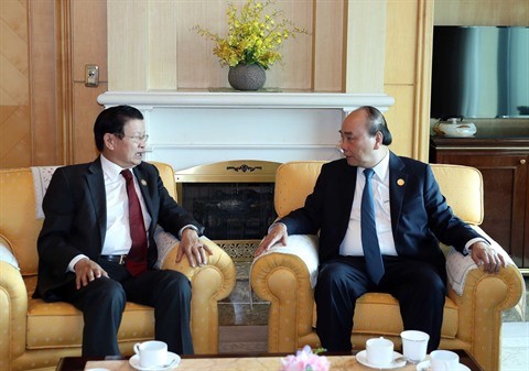 Le Premier ministre laotien en visite au Vietnam - ảnh 1