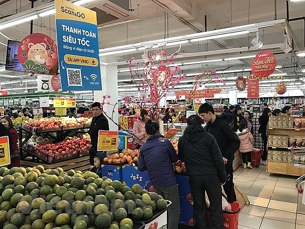 Têt : les supermarchés ouvrent dès le deuxième jour du premier mois lunaire - ảnh 1