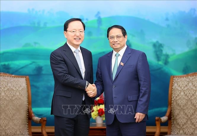 Perdana Menteri Pham Minh Chinh menerima Presiden/CFO Grup Samsung - ảnh 1