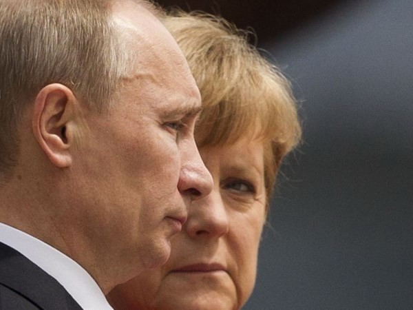 Putin und Merkel führen Telefongespräch über die Unruhen in der Ostukraine - ảnh 1