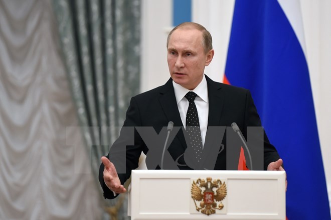 Der russische Präsident Wladimir Putin startet die Jahres-Pressekonferenz - ảnh 1