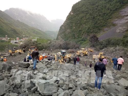 Mehr als 140 Menschen sind nach Erdrutsch in China verschüttet - ảnh 1
