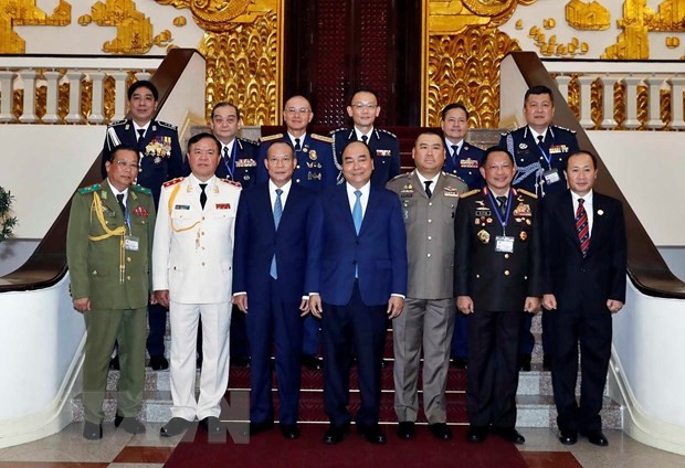Premierminister Nguyen Xuan Phuc empfängt die Leiter der Delegationen bei der Konferenz der ASEAN-Polizei-Kommandeure  - ảnh 1