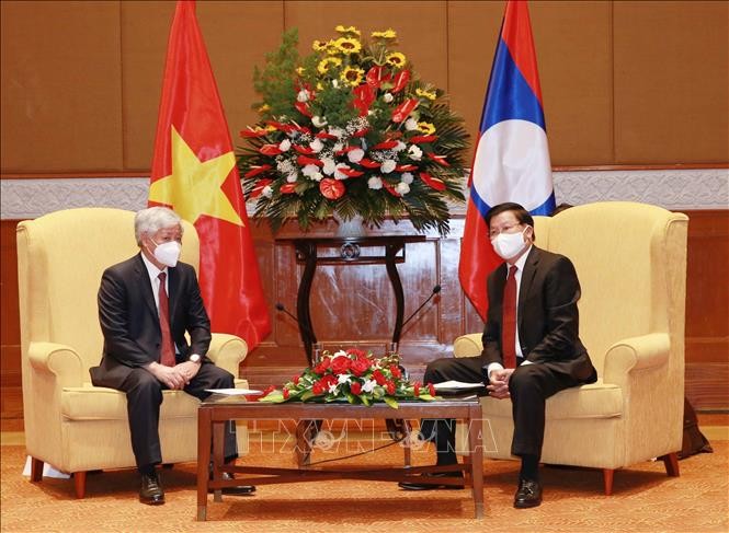 Aktivitäten des Partei-Generalsekretärs Laos Thongloun Sisoulith während des Besuchs in Vietnam - ảnh 1