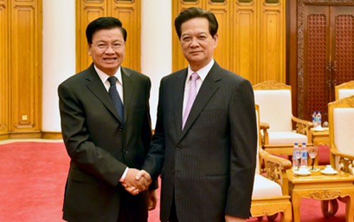 Các vị lãnh đạo Đảng, Nhà nước, Chính phủ Việt Nam tiếp đoàn đại biểu cấp cao CHDCND Lào - ảnh 1