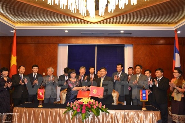 Hội đàm cấp cao giữa Bộ Tư pháp hai nước Việt Nam - Lào  - ảnh 1