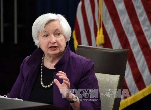 ФРС повысила базовую процентную ставку до 1-1,25% - ảnh 1