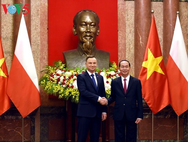 Президент СРВ Чан Дай Куанг устроил прием в честь президента Польши Анджея Дуды - ảnh 1