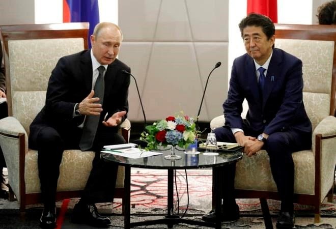 Путин и Абэ намерены обсудить вопрос заключения мирного договора - ảnh 1
