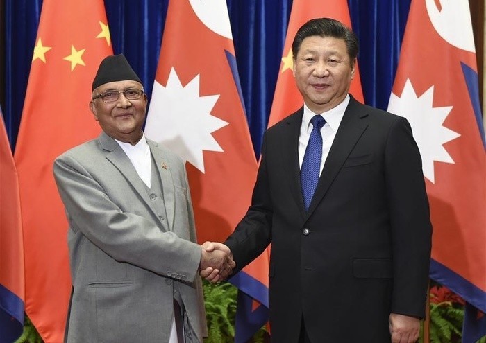 Председатель КНР Си Цзиньпин провел переговоры с премьером Непала Шармой Оли - ảnh 1