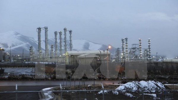 Tiongkok dan Iran menandatangani kontrak merancang kembali reaktor air berat Arak - ảnh 1