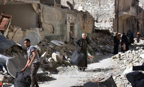 Tentara Suriah merebut kembali pangkalan udara dari tangan IS - ảnh 1