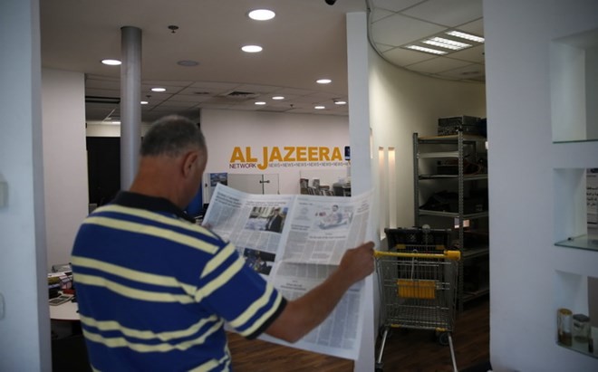 Israel menutup Kantor Perwakilan kanal al-Jazeera - ảnh 1