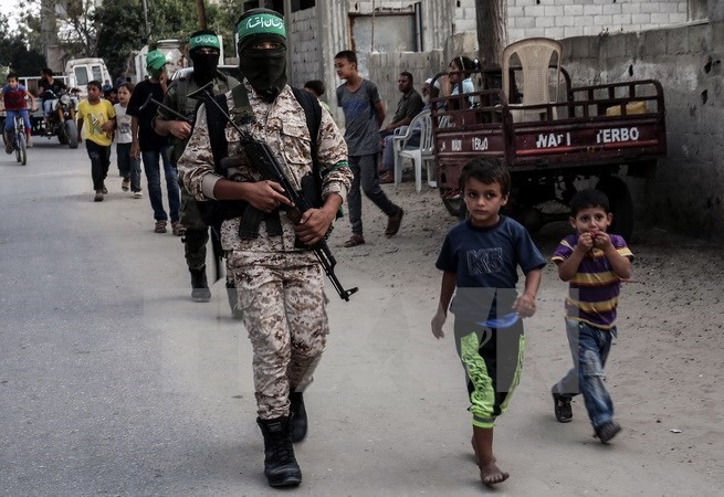 Palestina: Gerakan Hamas melaksanakan langkah serah terima pertama - ảnh 1