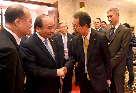 PM Vietnam, Nguyen Xuan Phuc melakukan pertemuan dengan beberapa investor di kawasan Asia-Pasifik - ảnh 1
