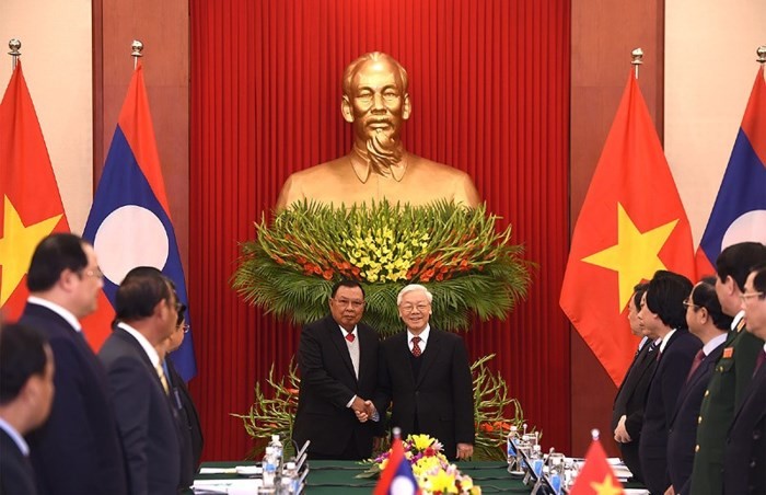 Sekjen, Presiden Laos, Bounnhang Vorachith mengakhiri dengan baik kunjungan persahabatan resmi di Vietnam - ảnh 1