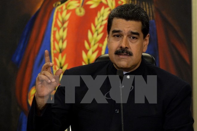 Presiden Venezuela berkomitmen akan menjamin partisipasi faksi oposisi pada pemilu - ảnh 1