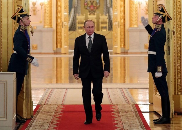 Pilpres Rusia: Presiden Vladimir Putin mempertahankan prosentase dukungan yang besar dalam jajak-jajak pendapat  - ảnh 1