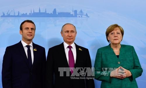 Pimpinan Rusia, Perancis dan Jerman melakukan pembicaraan telepon tentang situasi Suriah - ảnh 1