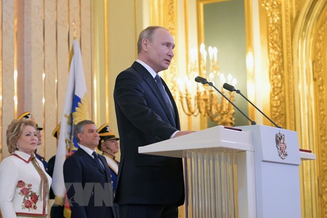 Presiden Vladimir Putin menetapkan tugas strategis dalam mengembangkan negeri Rusia - ảnh 1