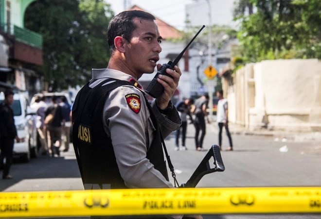 IS bertanggung jawab melaksanakan serangan bom terhadap Kantor Kepolisian di Kota Surabaya - ảnh 1