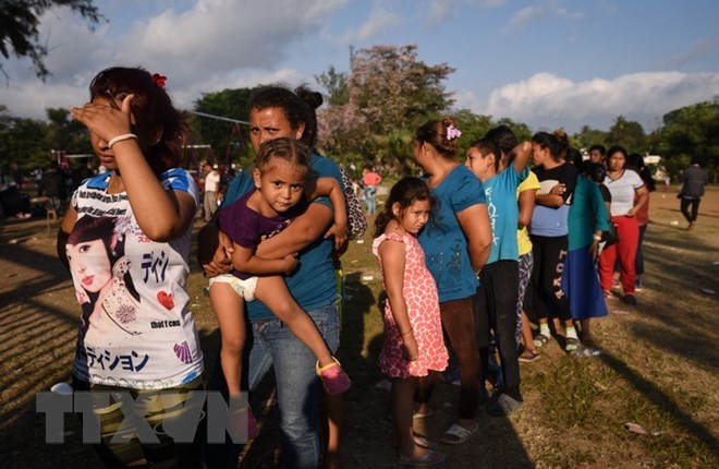 Masalah migran: AS bertekad mempertahankan kebijakan garis perbatasan keras - ảnh 1